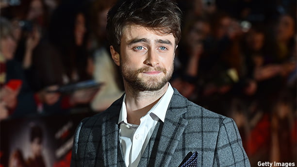British actor Daniel Radcliffe poses for photographers on the red carpet as he arrives for the UK Premier of "Horns" in central London on October 20, 2014. AFP PHOTO / BEN STANSALL        (Photo credit should read BEN STANSALL/AFP/Getty Images)